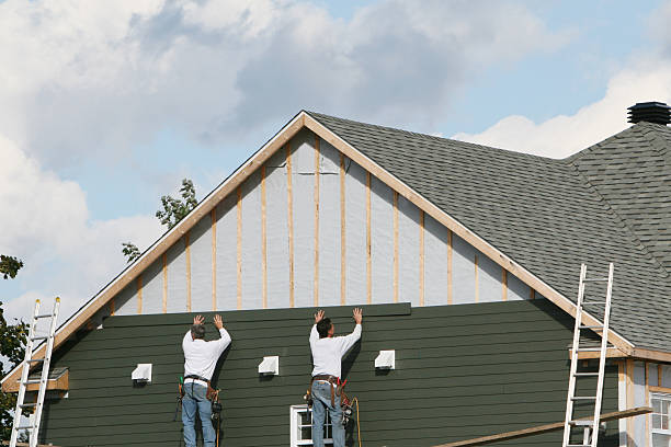 Professional Vinyl Siding technician working in Everett, MA